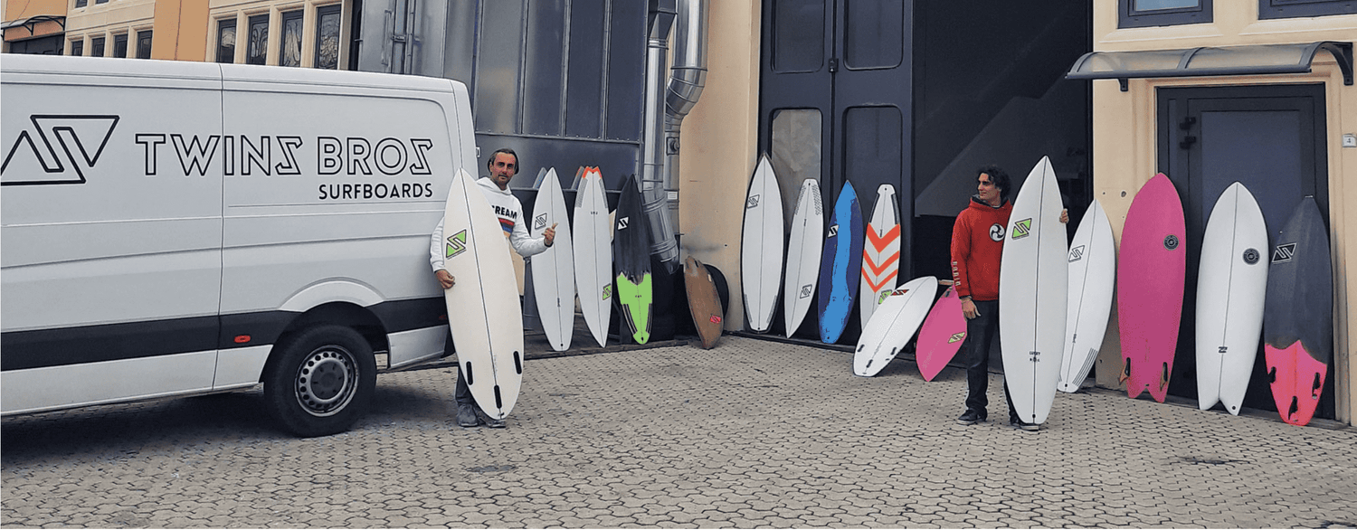 factory twins bros surfboards in front